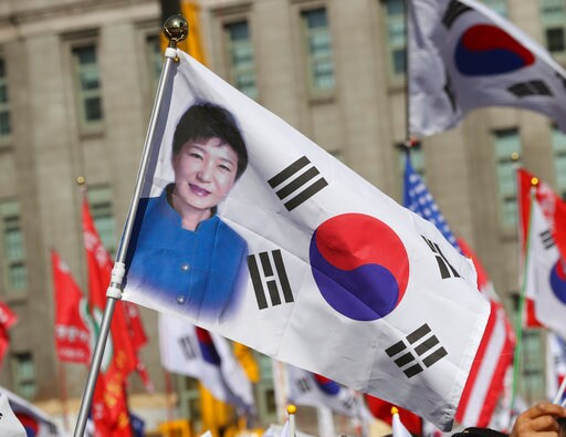 The Latest: Ousted S.Korea Leader Leaves Presidential Palace