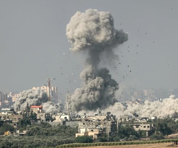 an explosion over a city in gaza