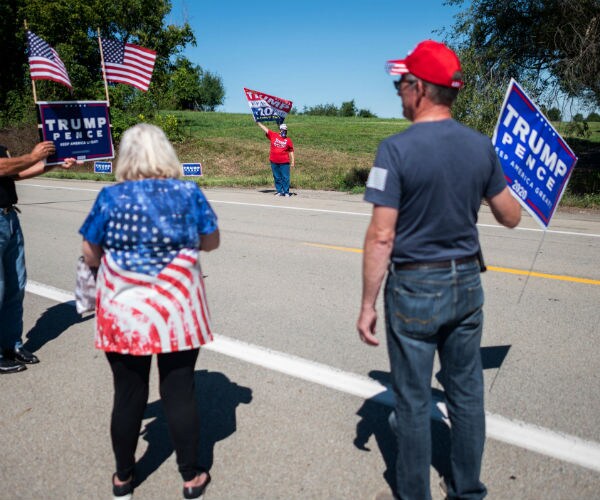 trump signs and flags voter drive  