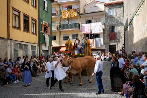 Ox-pulled Floats with Sacred Images of Mary Draw Thousands to Portugal's Wine-country Procession