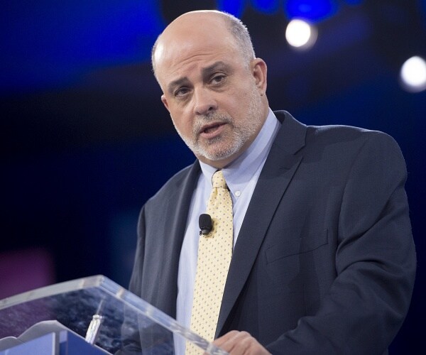 mark levin leans on podium