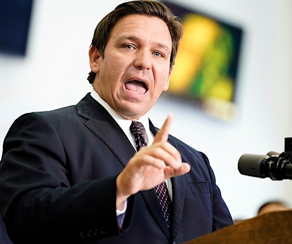 ron desantis speaks during a news conference