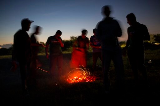 The Latest: Mexican Official Sees Election Link to Caravan