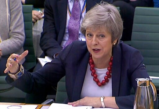 May Faces More Brexit Woes after UK Minister Quits