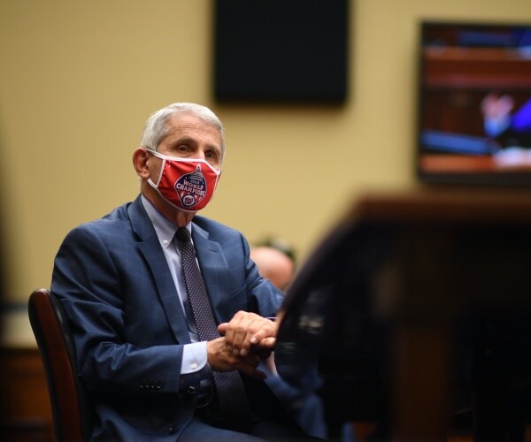 Anthony Fauci sitting on capitol hill testifying 