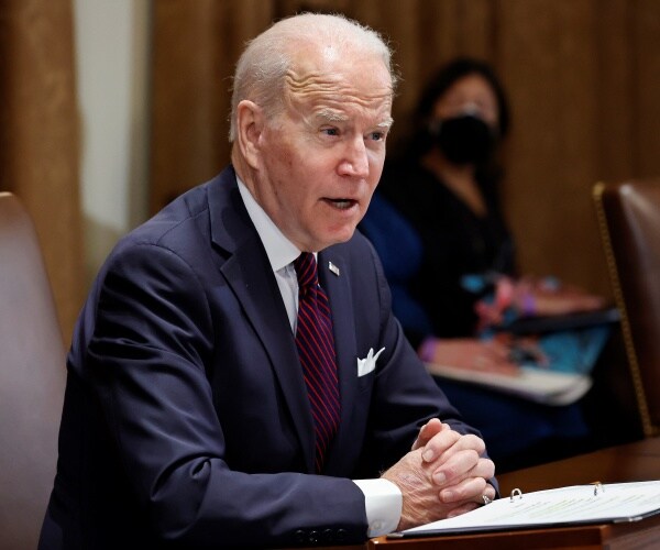 Joe Biden talks to reporters
