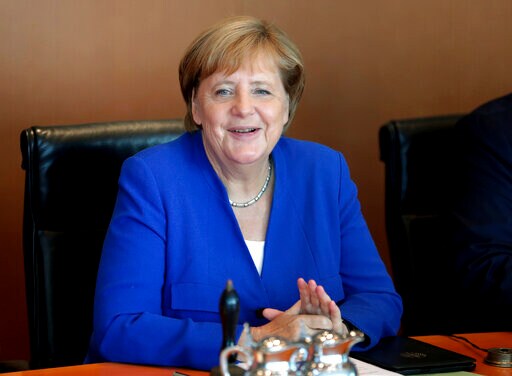 Germany's Merkel Faces Balancing Act in Beijing