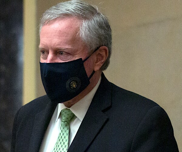 mark meadows walks out of negotiations on capitol hill wearing a face mask
