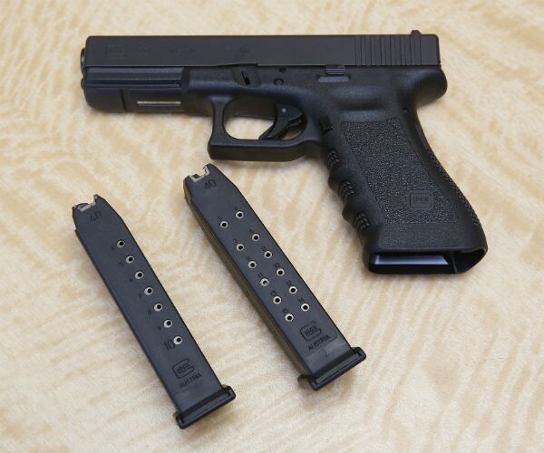a pistol and two magazines
