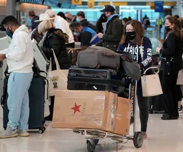 travelers stuck at the airport