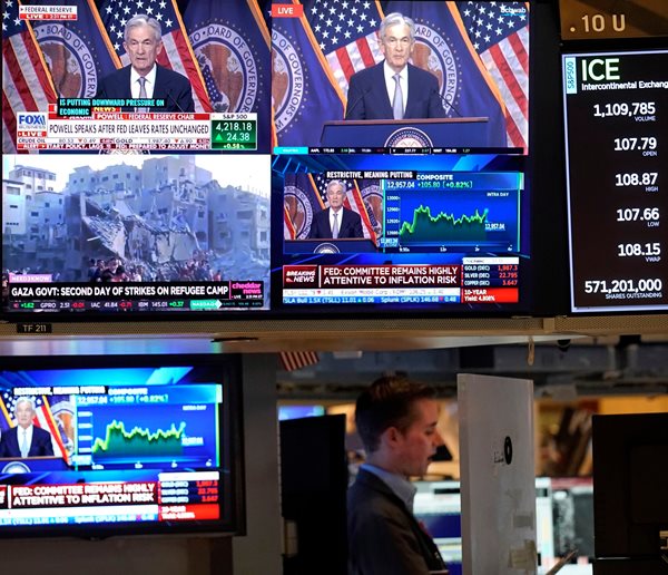 Wall Street Advances as Fed Keeps Rates Steady