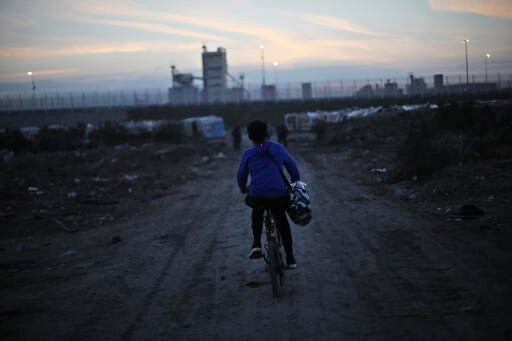 Makeshift Migrant Church in Calais Holds Final Service