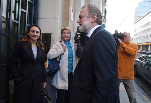 The Latest: Pound Trading Lower in the Run-up to Brexit