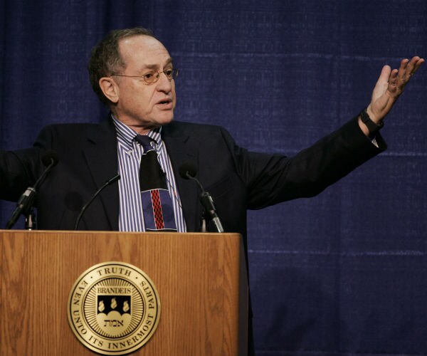 alan dershowitz addressing an audience at brandeis university