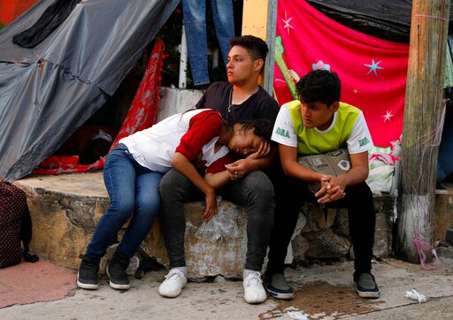 The Latest: UNICEF Highlights Perils for Children on Caravan
