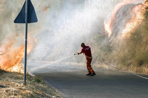 Italy Wildfires Force Evacuations, Cause Disruption