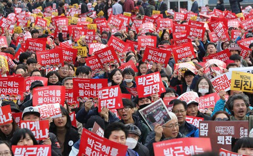 With Rock Music and Pinatas, S. Koreans Rally against Park