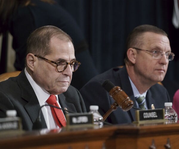 House Judiciary chairman Jerrold Nadler is shown with a gavel with Rep. Doug Collins also pictured.