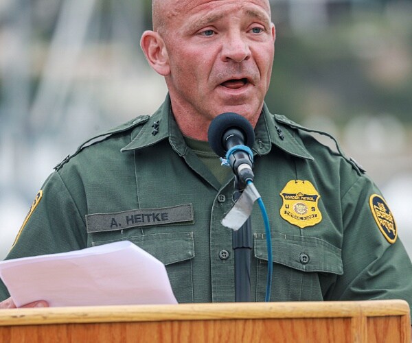 aaron heitke speaks to press