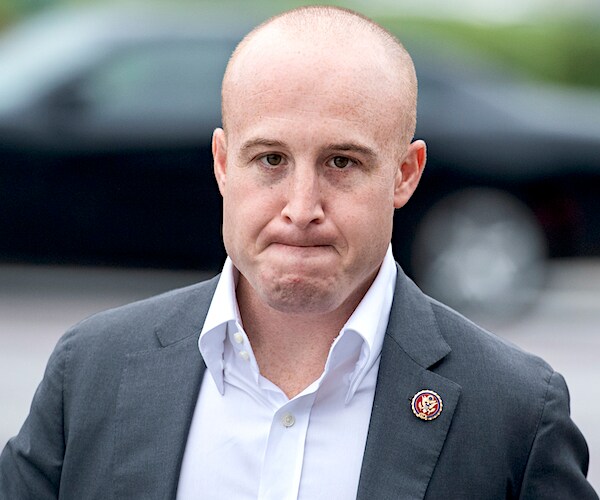 max rose walks outside and bites his lip