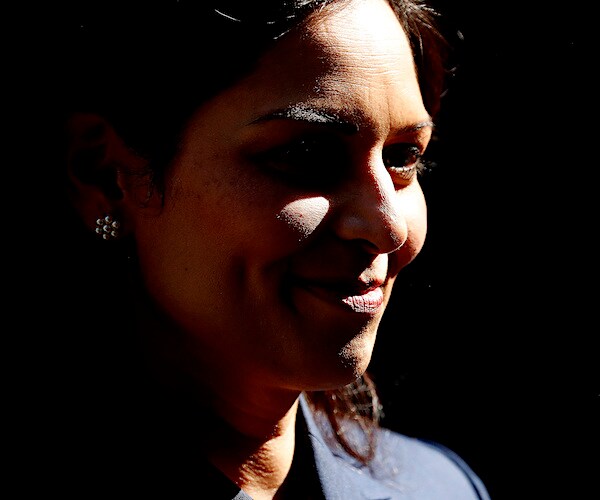 Britain's Home Office Secretary Priti Patel leaves after a Cabinet meeting