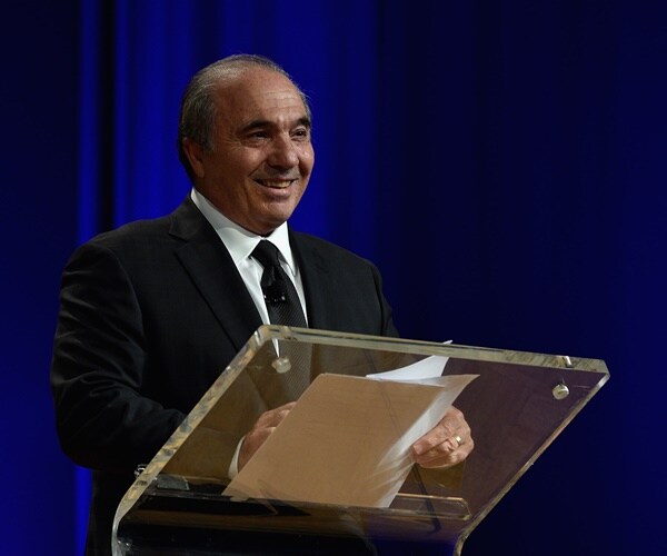 Rocco B. Commisso speaks at an awards ceremony