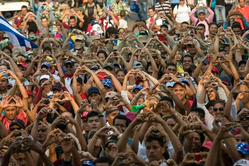 The Latest: Hundreds Camp Overnight to Help Aid to Venezuela