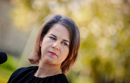 German FM Pledges Accountability for Killings in Bucha