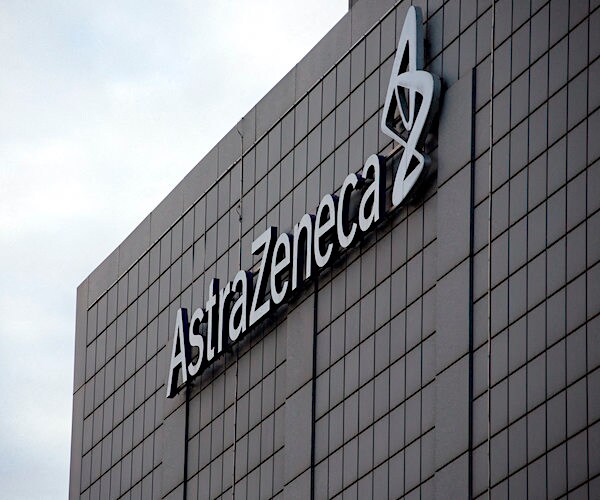 the astrazeneca building against a cloudy sky