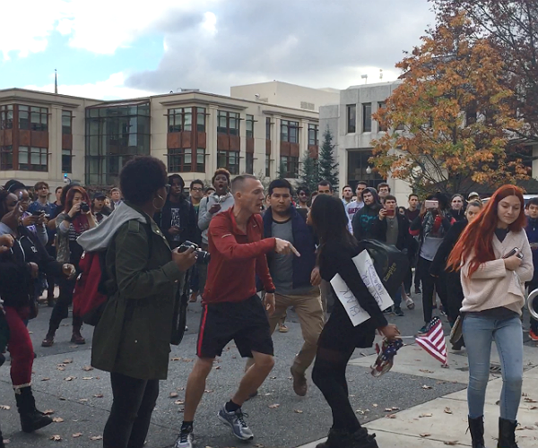 Flag Rescuer Keeps Job at American University