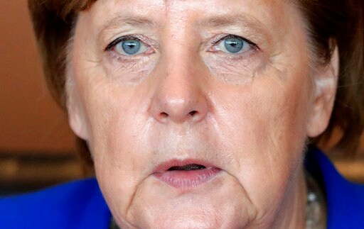 Germany's Merkel Faces Questions over Migration, Ties to US