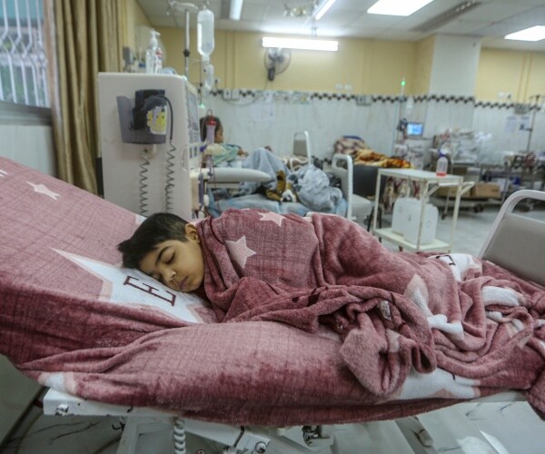 sick child in hospital in Gaza