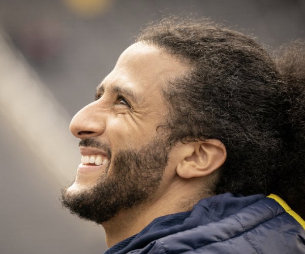 colin kaepernick interacts with fans