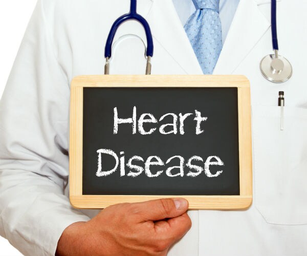 graphic shows a doc holding up a board showing the words 'heart disease'