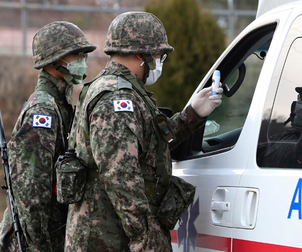 south korean soldiers man a checkpoint at a military base in daegu