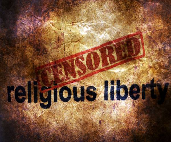 the words religious liberty with a stamp censored over them