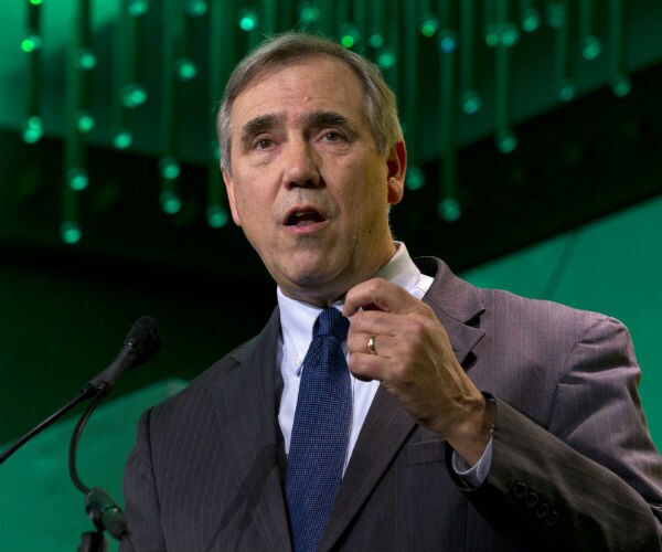 sen. jeff merkley speaking at a podium