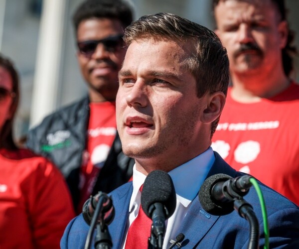 madison cawthorn speaks at a press conference