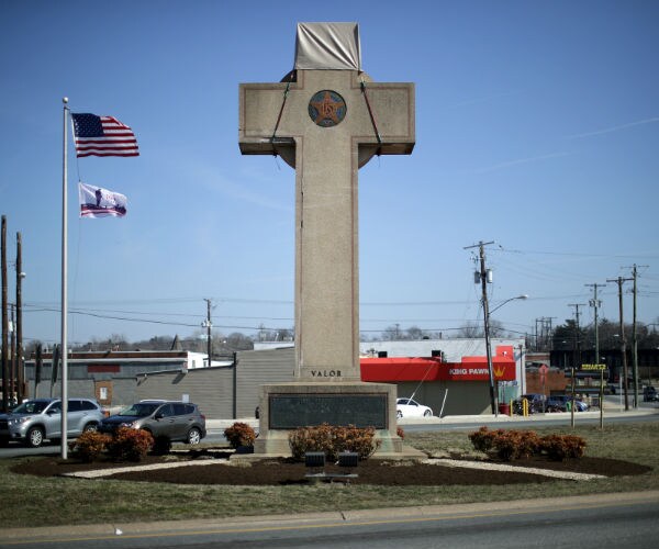 A Concrete Cross Survives the Bulldozer