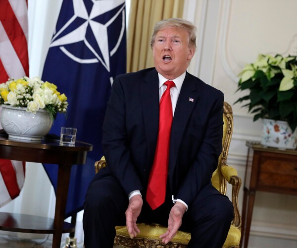 President Donald Trump speaks at the NATO Summit