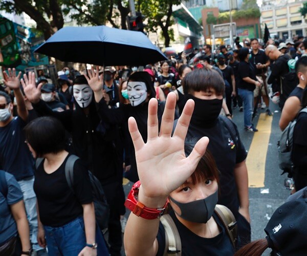 Hong Kong Pro-Democracy Activists Granted Asylum in Australia and Britain