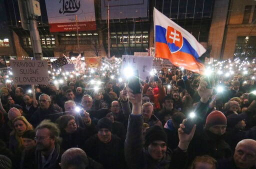 The Latest: Slovak Party Demands New Election over Slaying