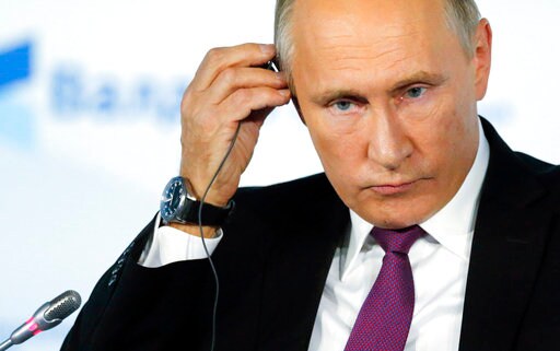 The Latest: Russia to Retaliate If US Restricts Russia Media