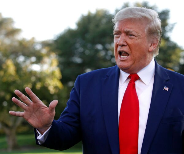 donald trump addresses members of the news media on the south lawn of the white house  