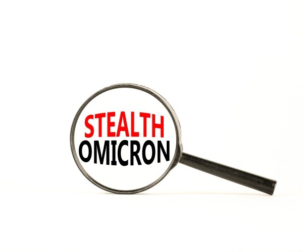 magnifying glass looking at the words "Stealth Omicron"