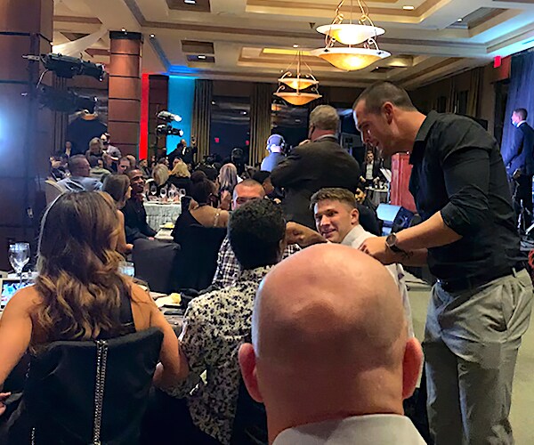 quarterback Derek Carr meets with people at a charity event held by teammate Darren Waller on Monday, Sept. 28