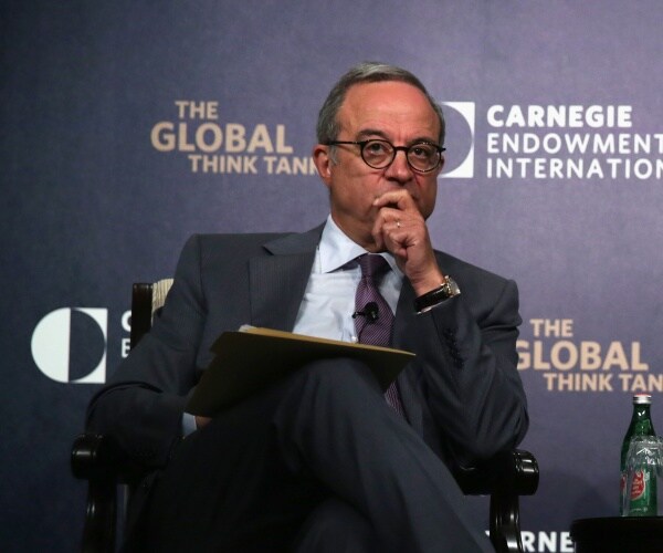 Marwan Muasher looks on