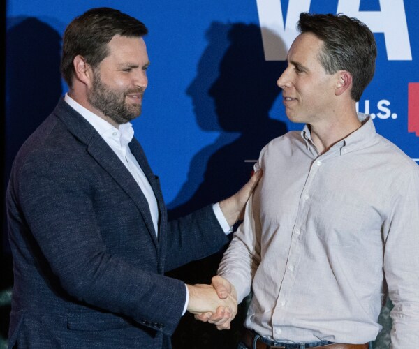 vance and hawley shaking hands at a campaign appearance