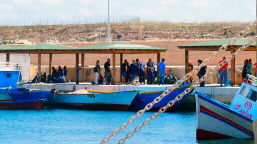 The Latest: 31 Migrants Taken off Italian NGO Rescue Ship