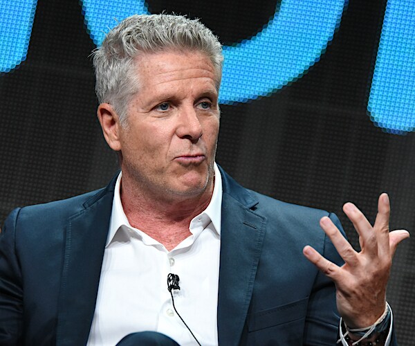 donny deutsch gestures while speaking to the crowd during a convention